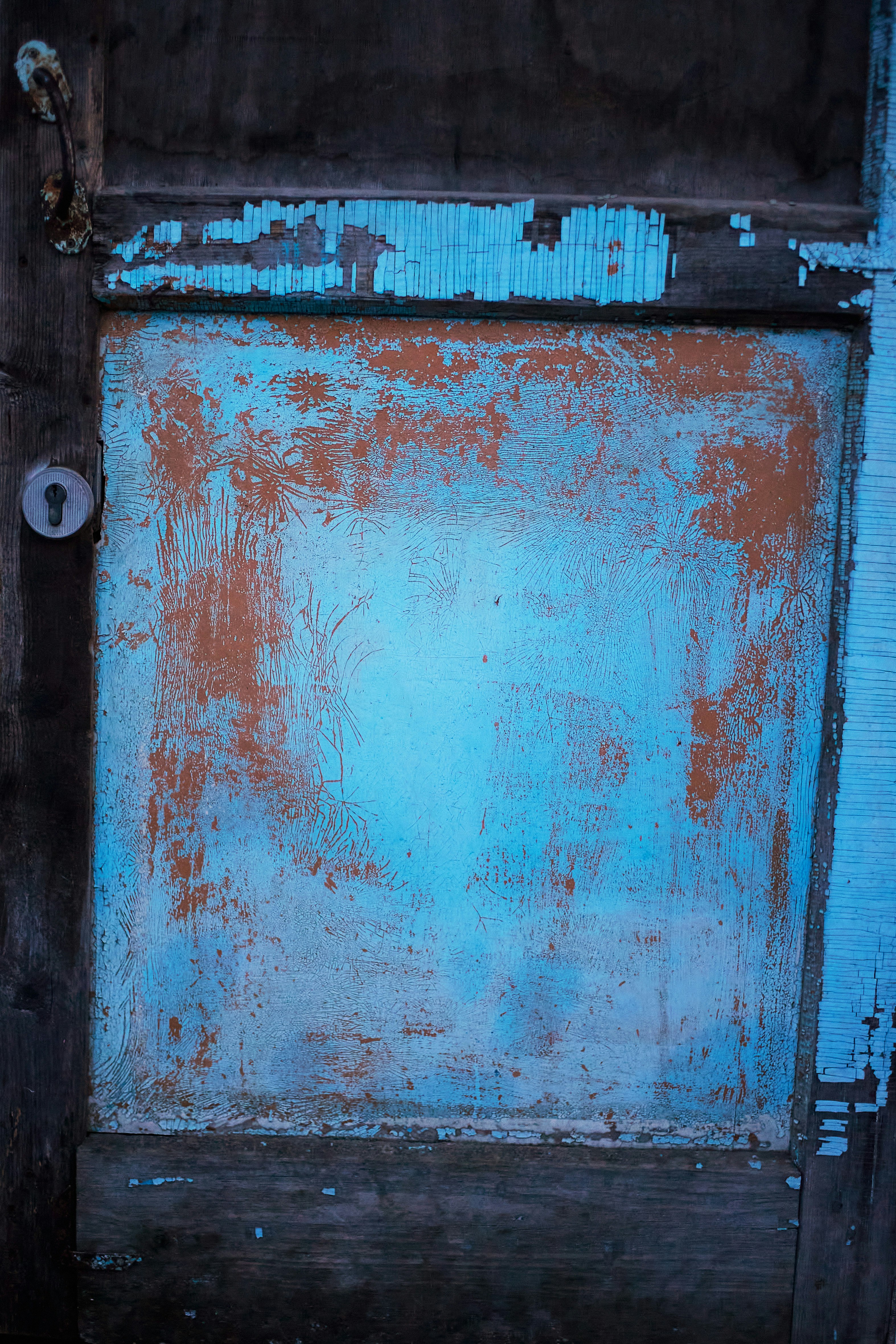 blue and brown wooden door